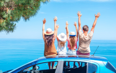 Family enjoying the view from their car during a Morocco road trip