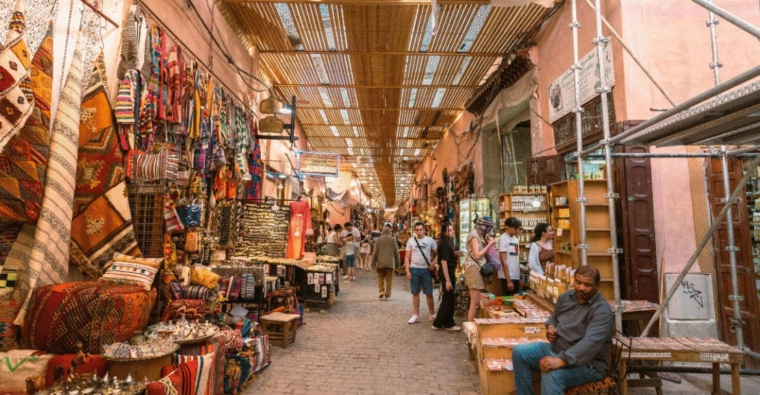 Colorful street scene in Marrakech Old Medina with traditional architecture