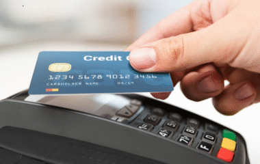 Person making a payment with a credit card on a POS machine in Morocco